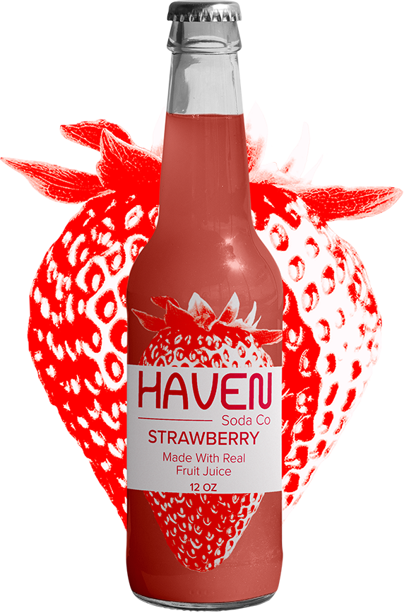 Haven strawberry soda bottle with strawberry behind the bottle.